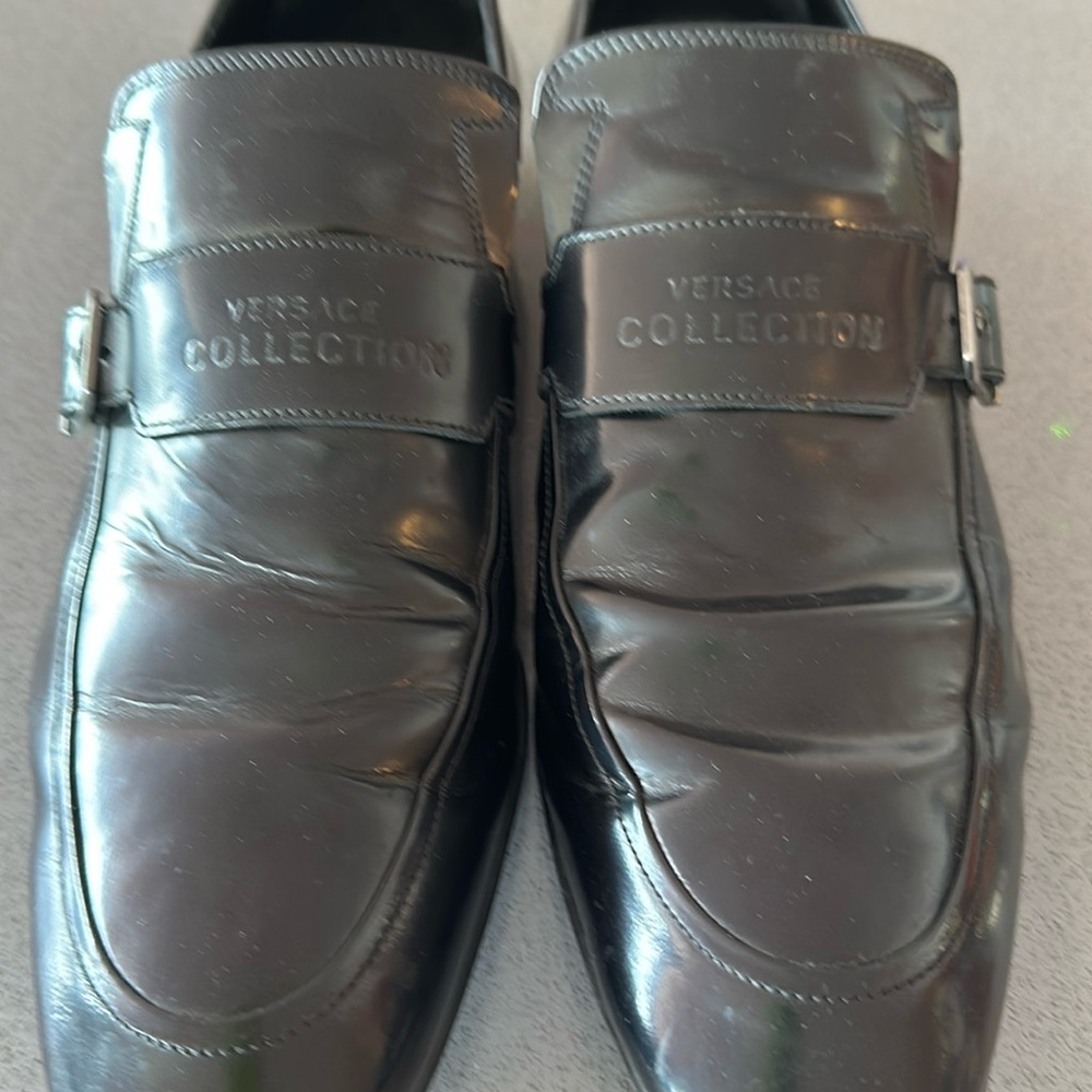 Versace size 42 European patent leather in black